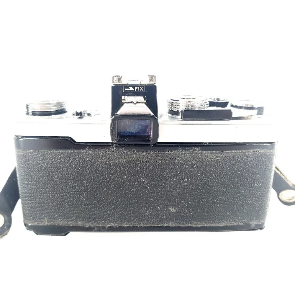 Olympus OM 1 35mm SLR Film Camera with 75-150mm Lens w/ Quantaray 135mm f/2.8